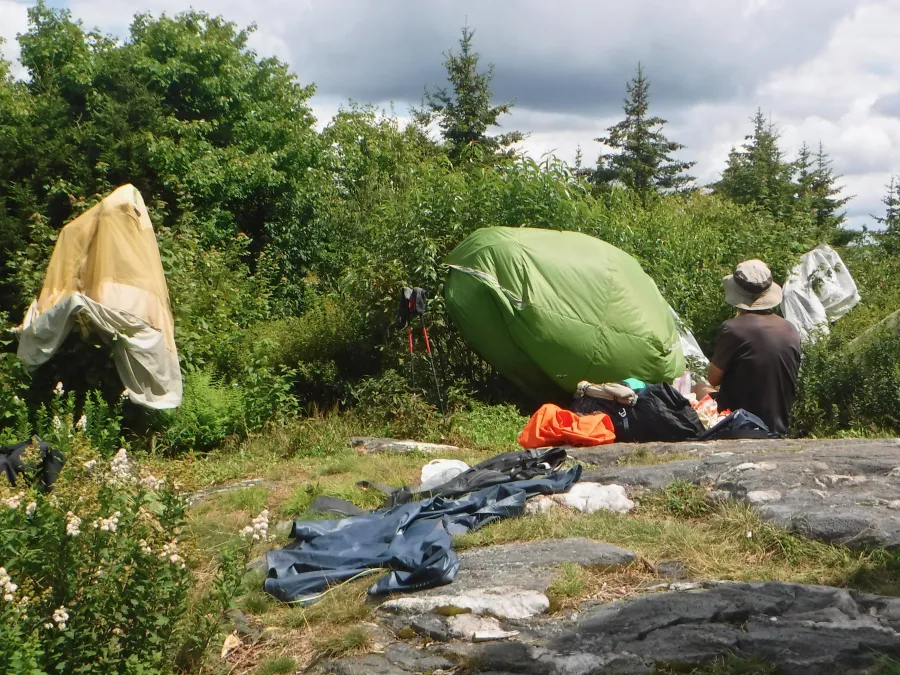 Yard sale of tents and sleeping bags
