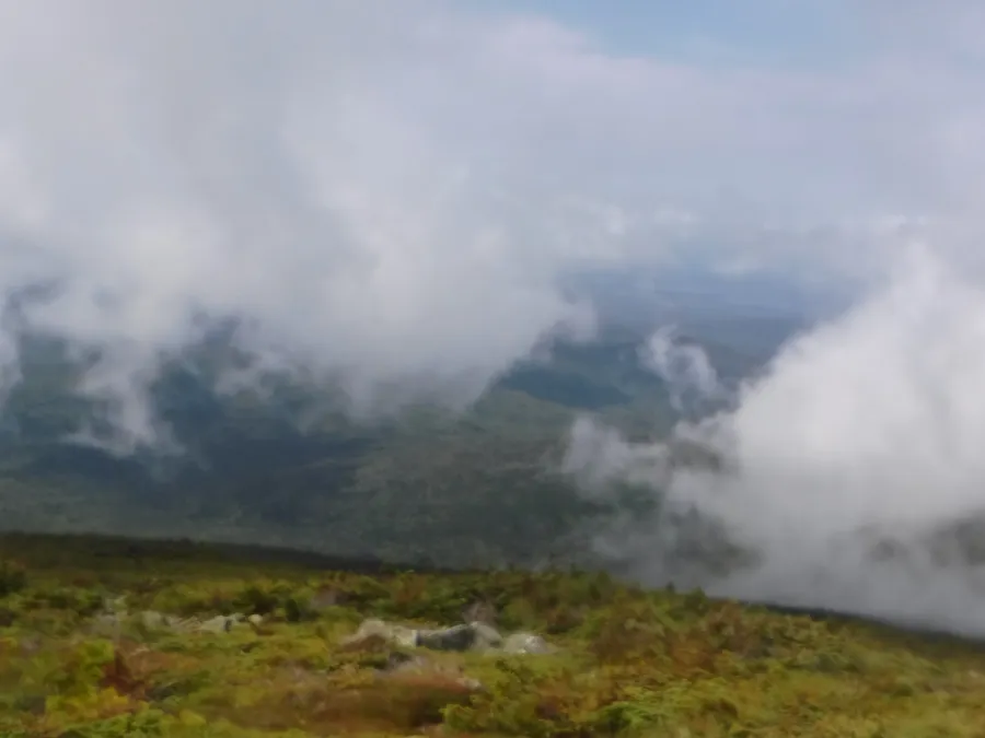Clouds begin to part and lift