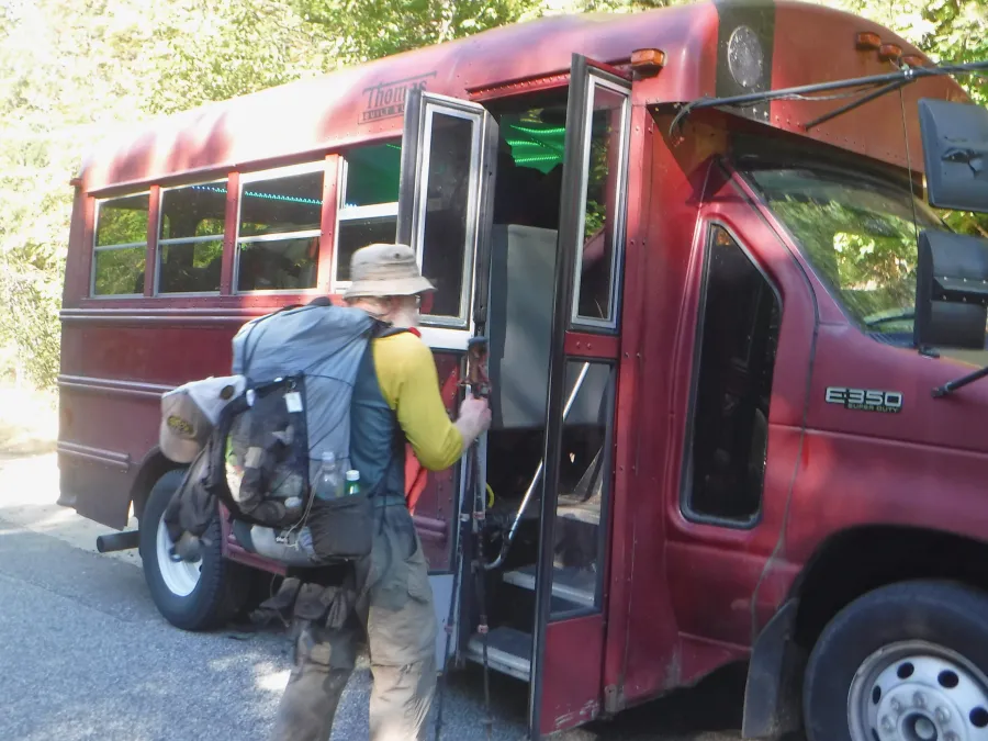 Stick boards the hostel bus