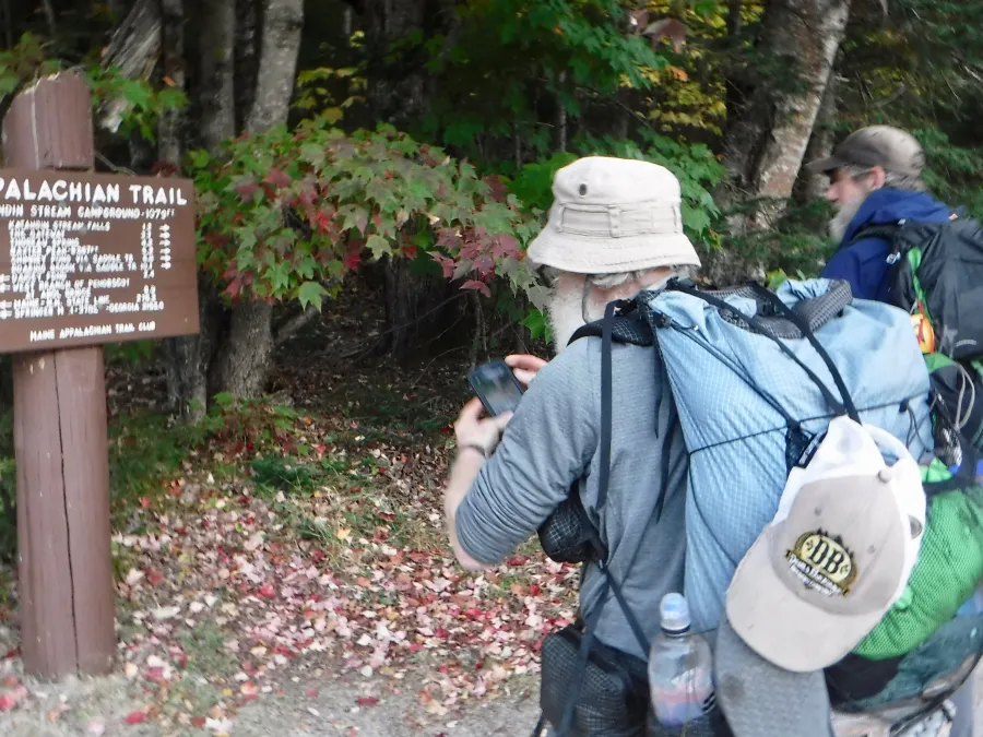 Stick and Tengo read Mt. Katahdin signs
