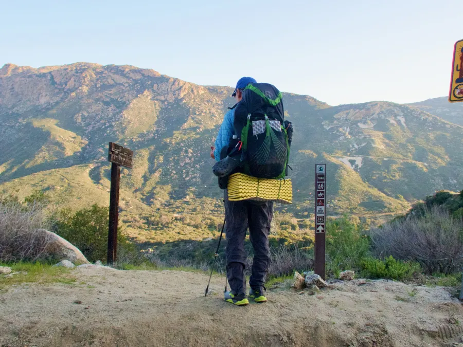 Tengo standing at edge of Hauser Canyon