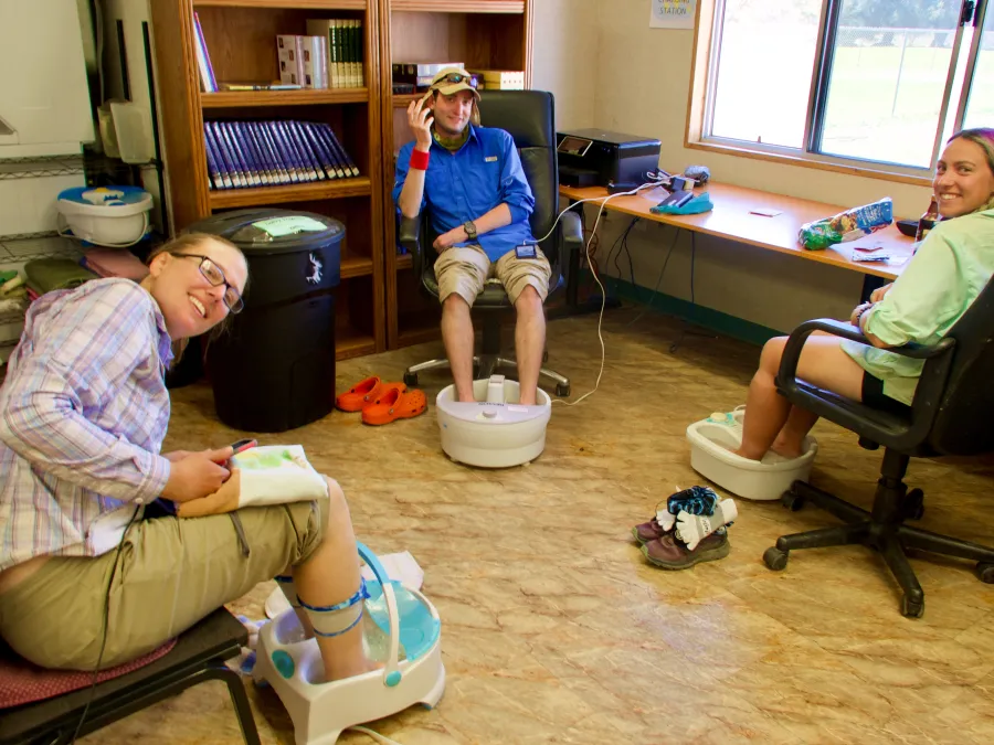 Gilligan, Falls and Deva soak their feet