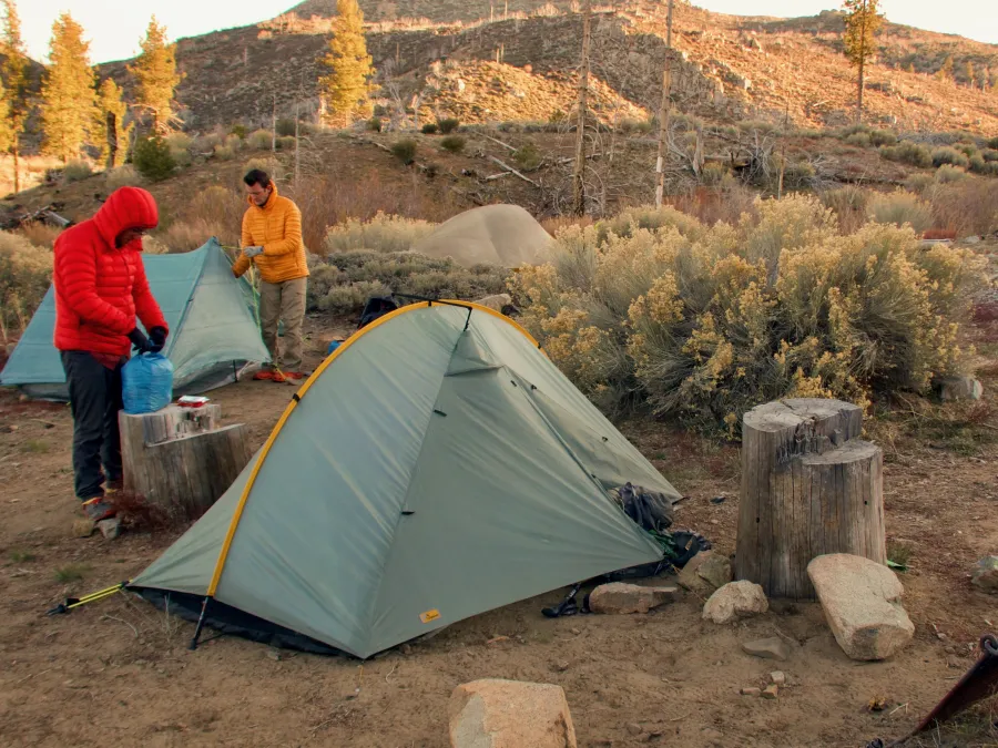 Taking down tents at Little Bear Springs Camp
