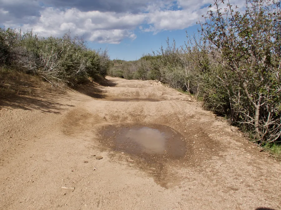 Rough road with large puddles