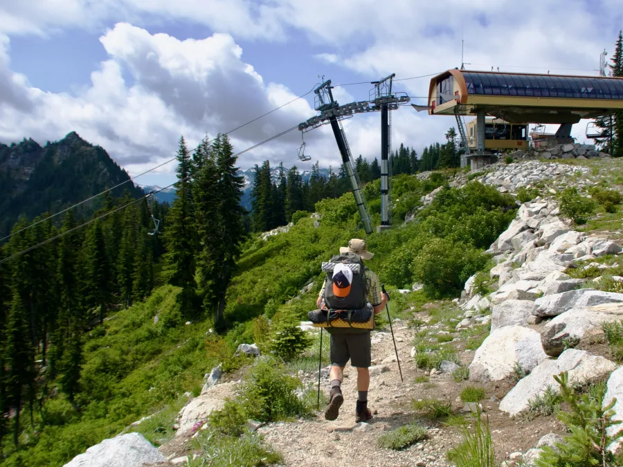 Ralph walks past a Stevens Pass ski lift