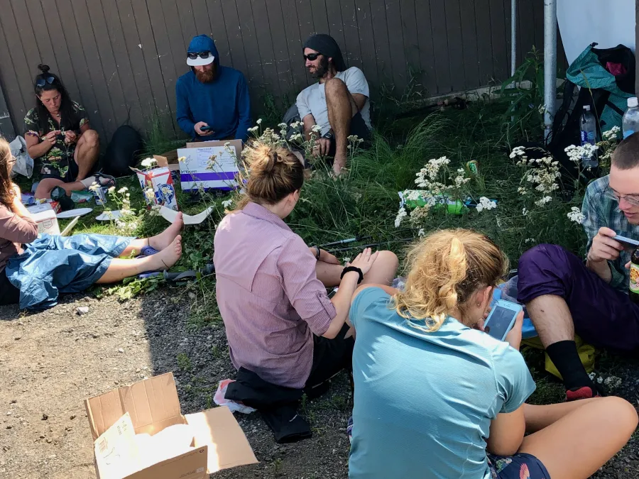Hikers sitting outside Kracker Barrel store at White Pass