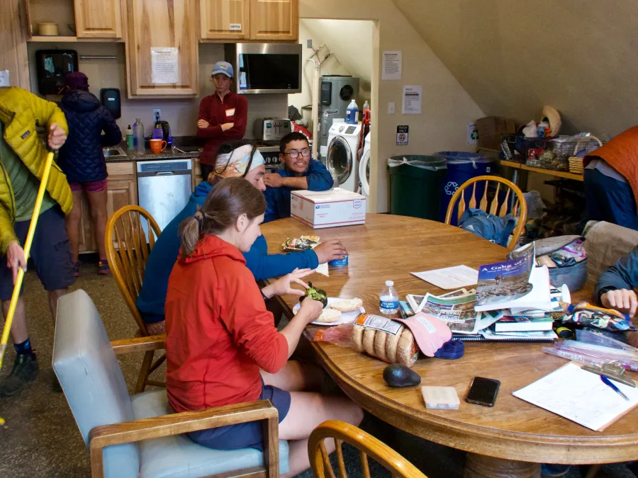Hikers in the PCT Welcome Center at Big Lake Youth Camp