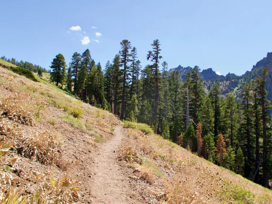 The trail continues over a ridge