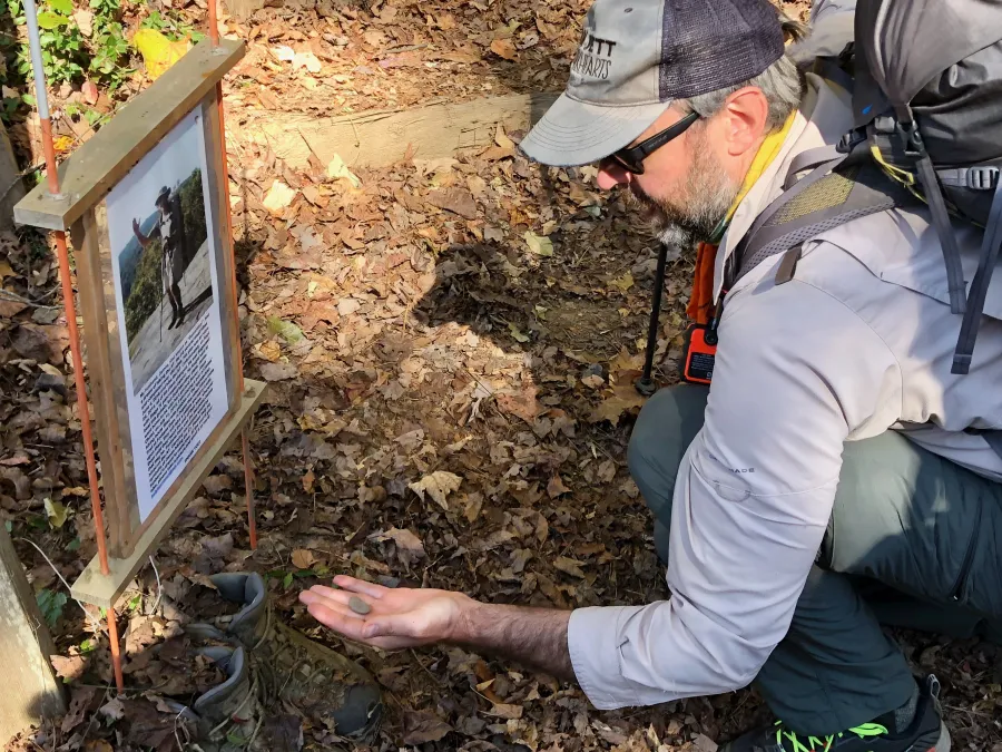 JA selects a pebble from BamaHiker's boots