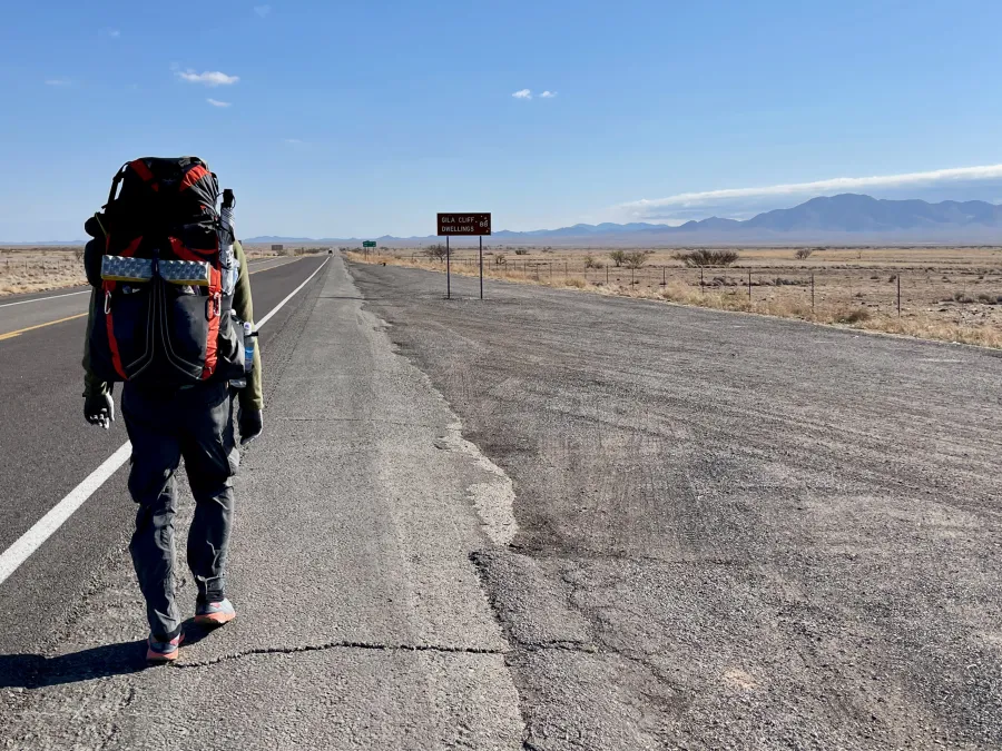 Walking on the other side of U.S. Highway 70