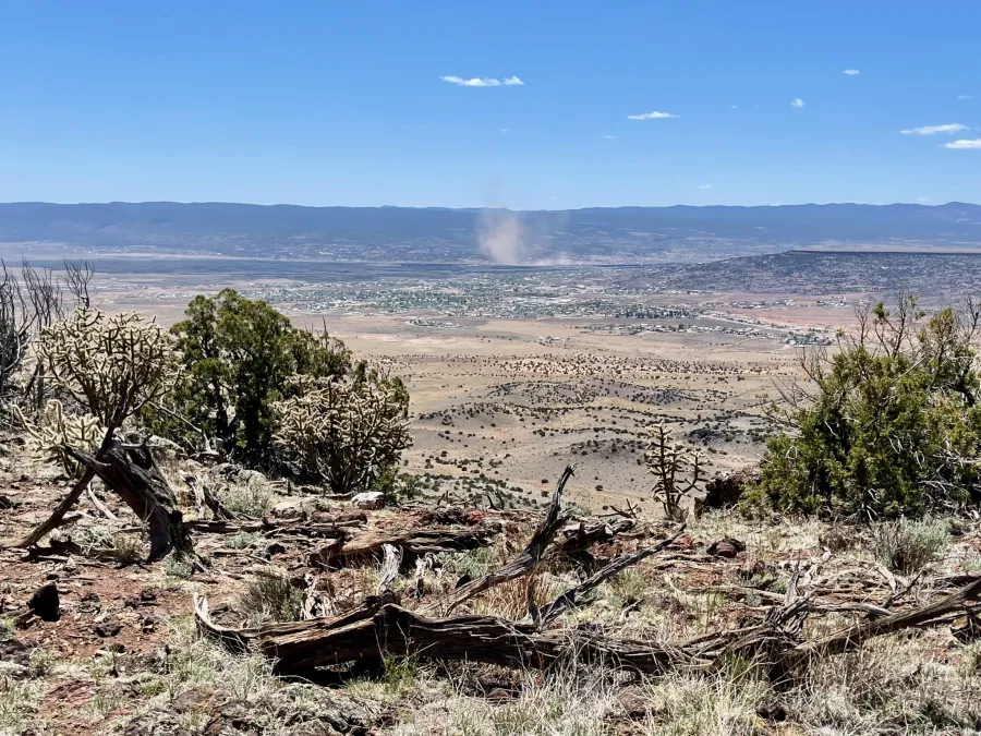 A large dust devil viewed in the distance