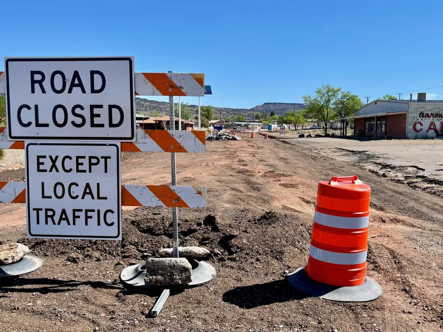 A road closed sign in a construction zone