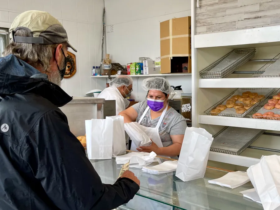 Buying donuts at Lovin’ Oven Bakery