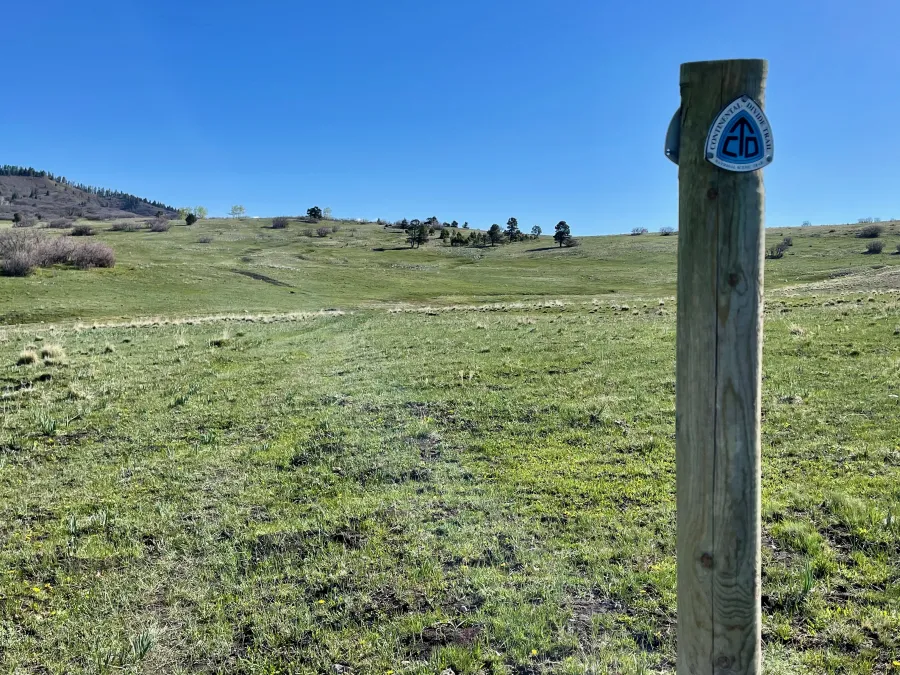 A marker identifies the path of the Continental Divide Trail