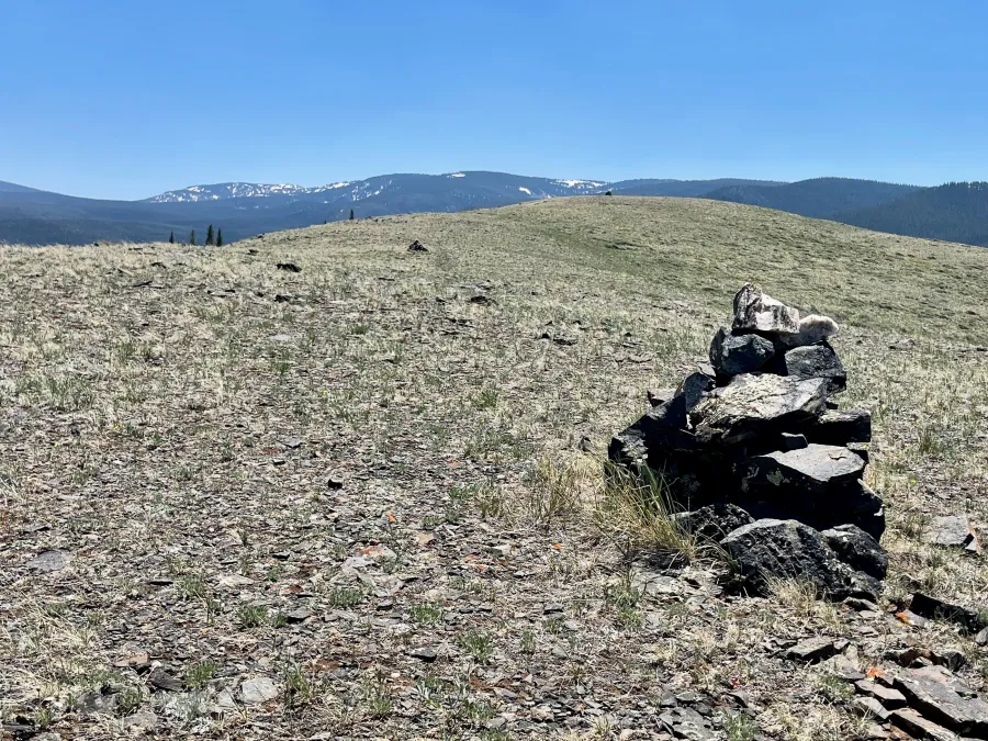 A bare ridge with cairns to mark the way