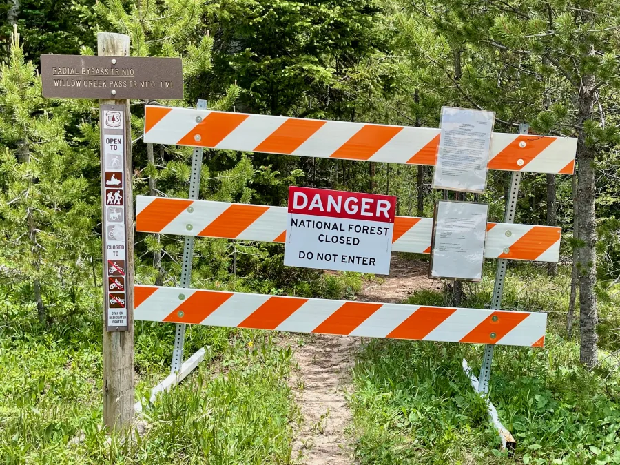 A trail closed sign