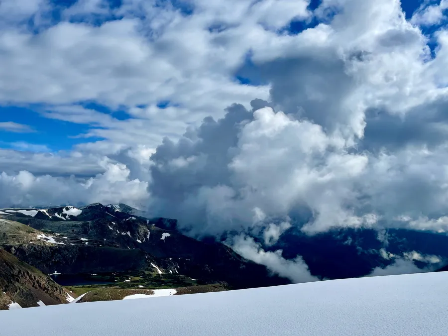 Clouds build in a valley