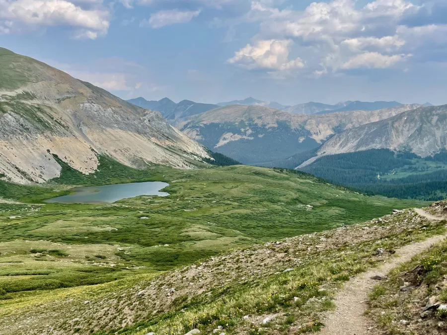 The trail crosses a ridge and enters Mineral Basin