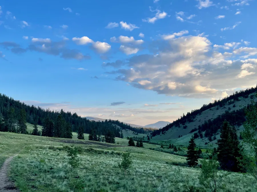 A partly cloudy sky in the morning