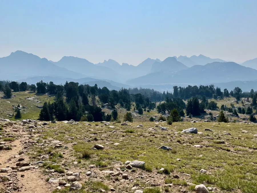A range of mountains can be seen in the distance