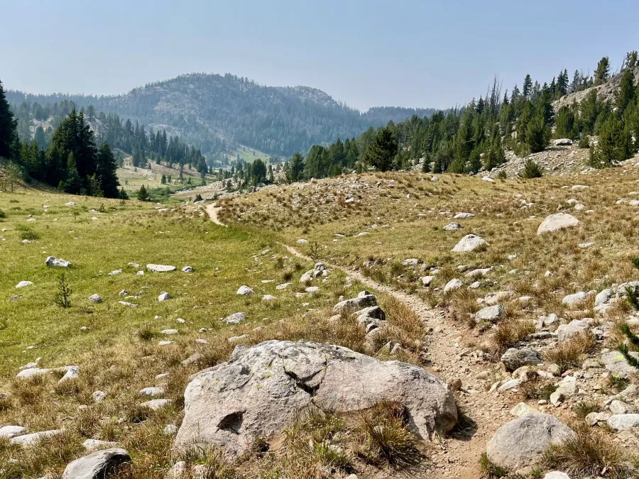 The trail descends toward Halls Butte