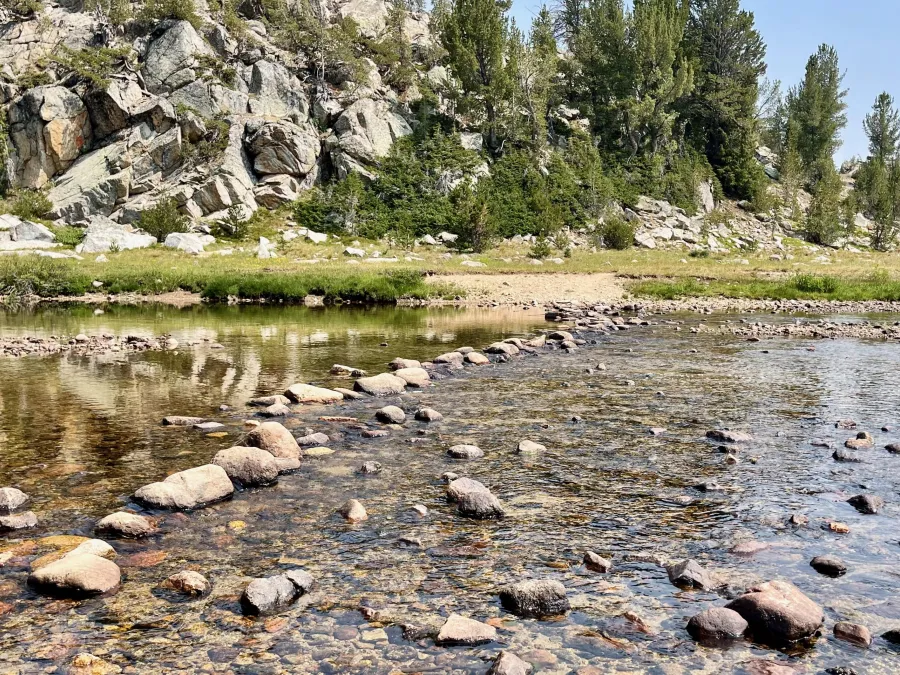 A wide stream to ford