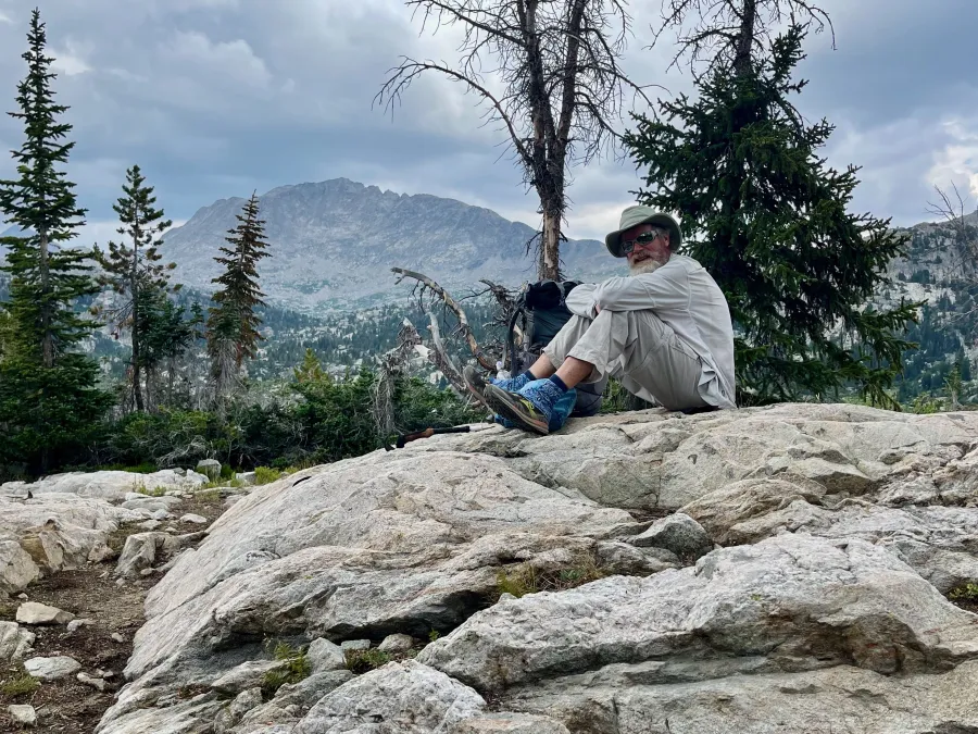 Top O' sits on a large boulder