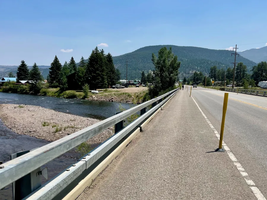 A wide UTV land next to the highway