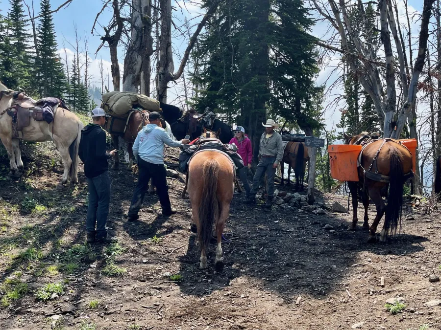 A family with horses at Eagle Pass