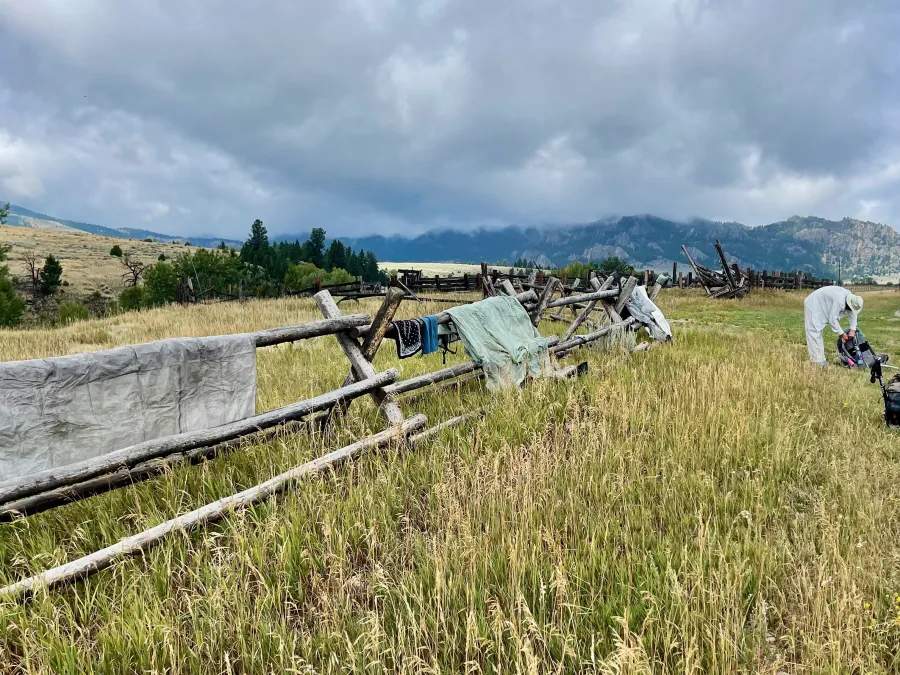 Stopping to dry gear on a fence