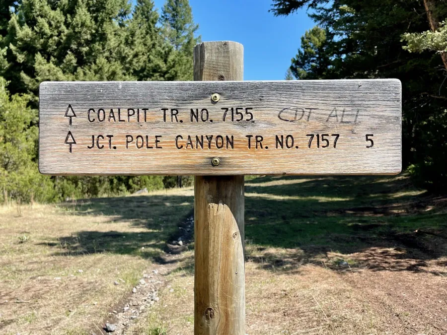 A sign points the direction of the Coalpit Trail