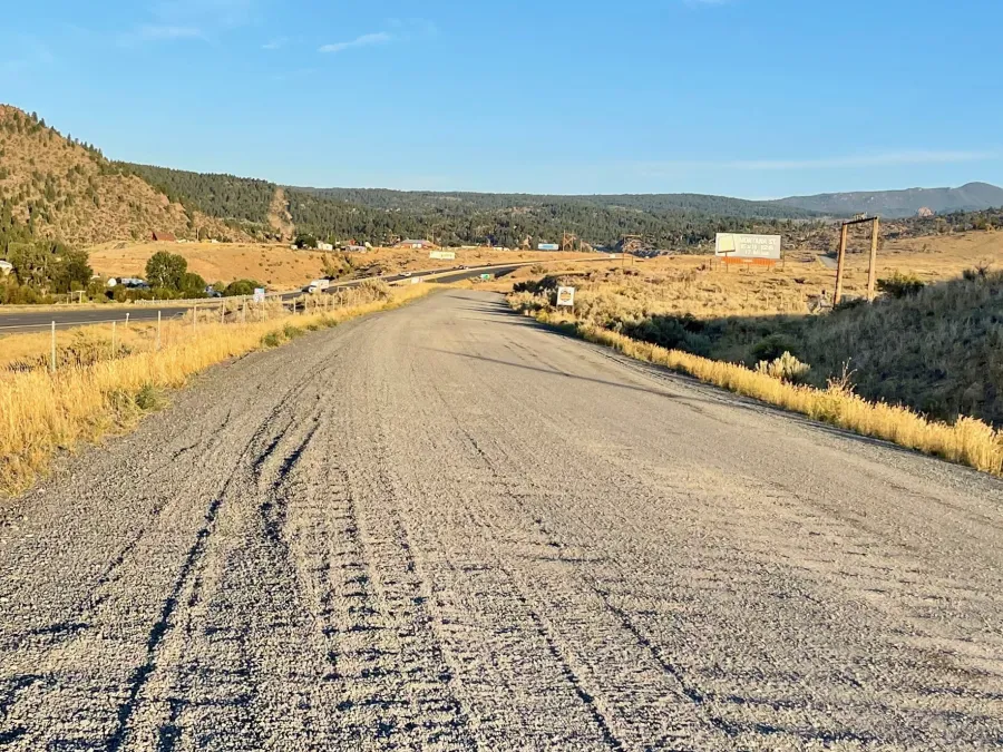 A gravel access road next to Interstate 90
