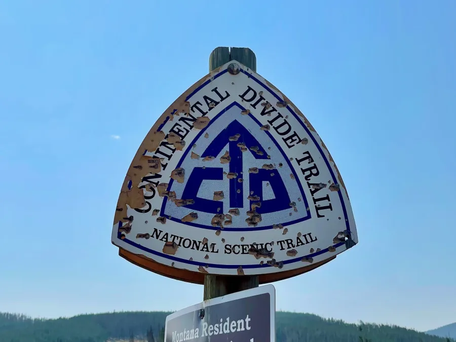 A CDT sign with bullet holes
