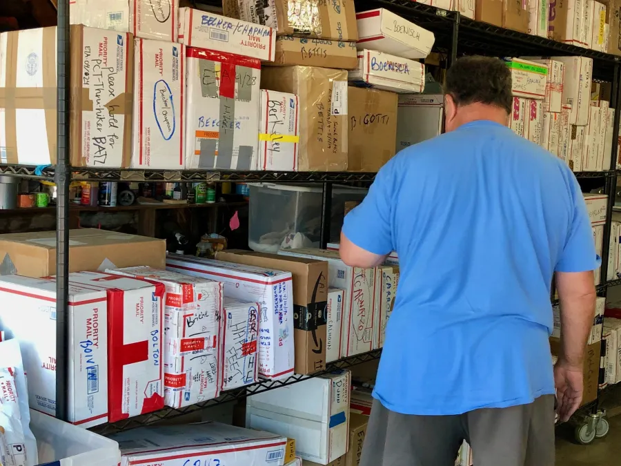 Shelves of mail at Hiker Heaven