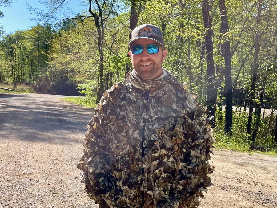 A turkey hunter dressed and ready to start hunting