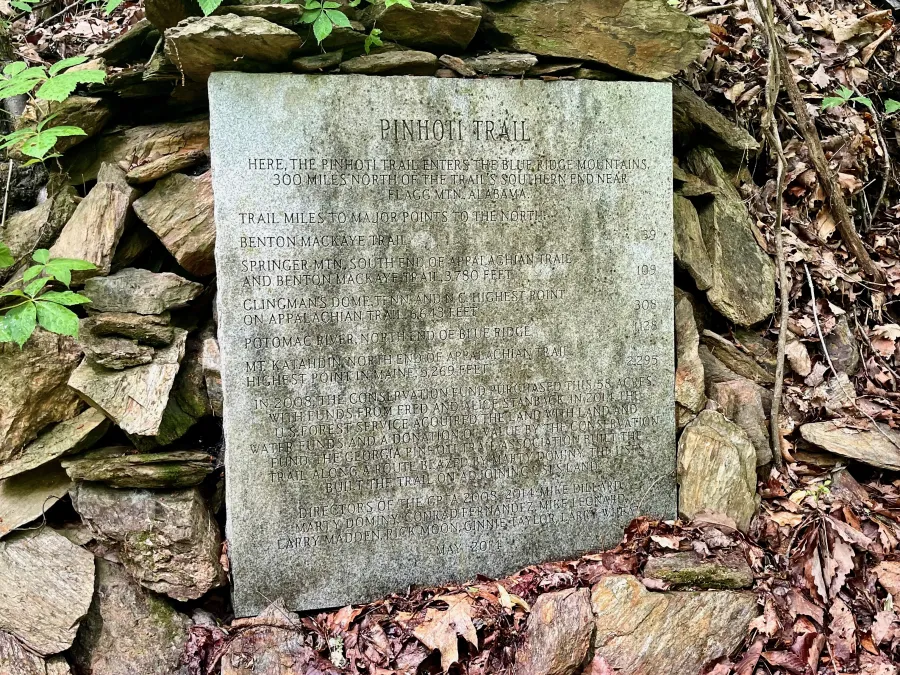 A stone marker listing distances to landmarks