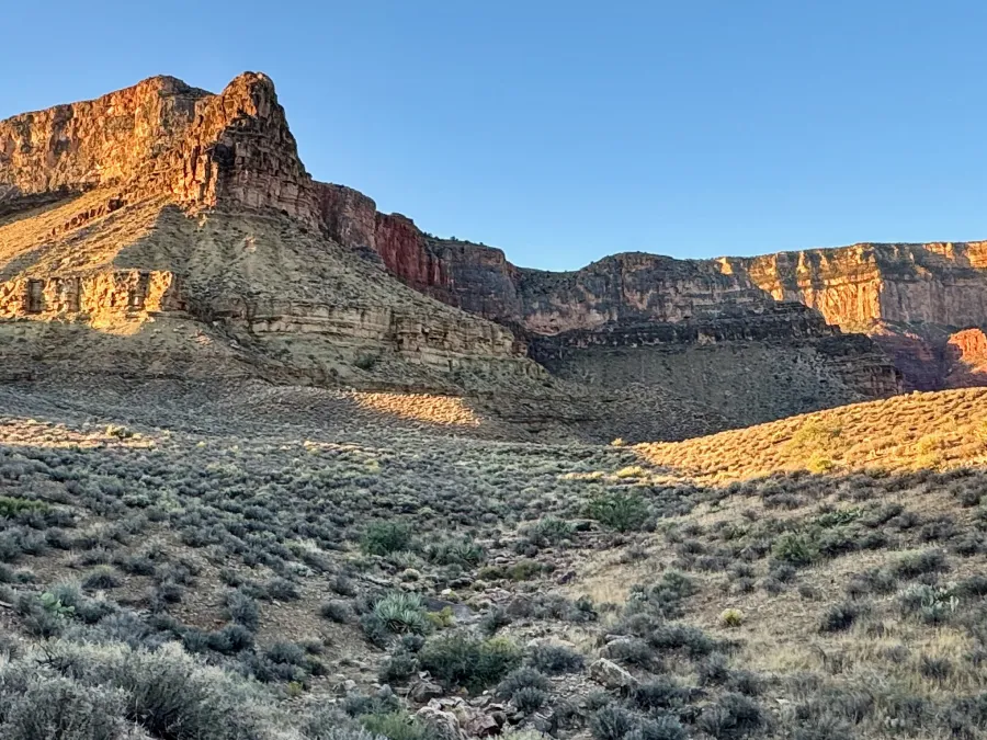 Sunlight hits the sides of the canyon