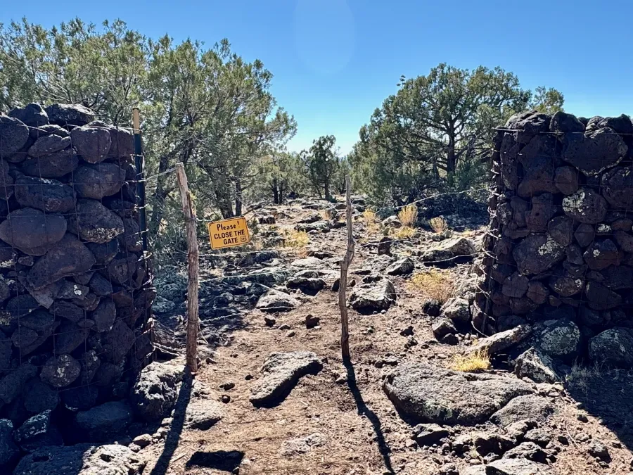 A gate made with stacked rocks