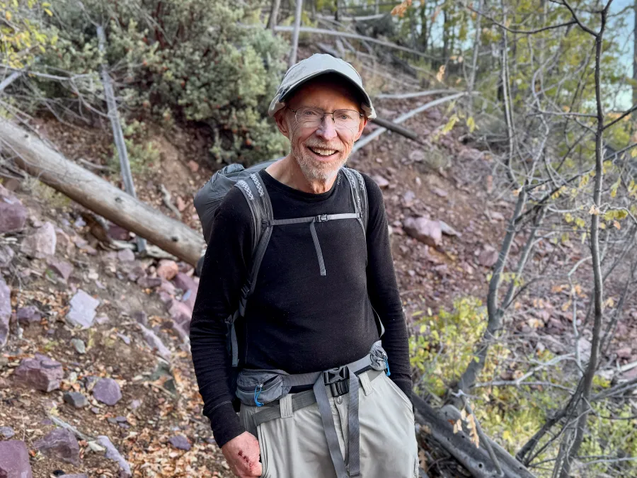 Gene, a hiker who always hikes northbound to avoid too much sun exposure