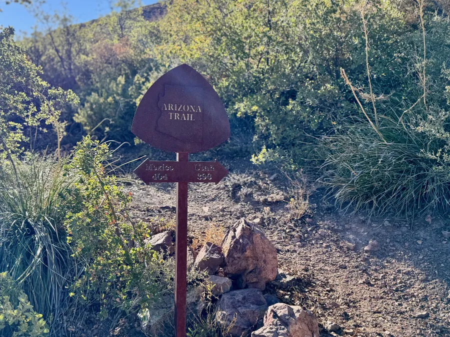 A sign marks the distance to Utah and Mexico