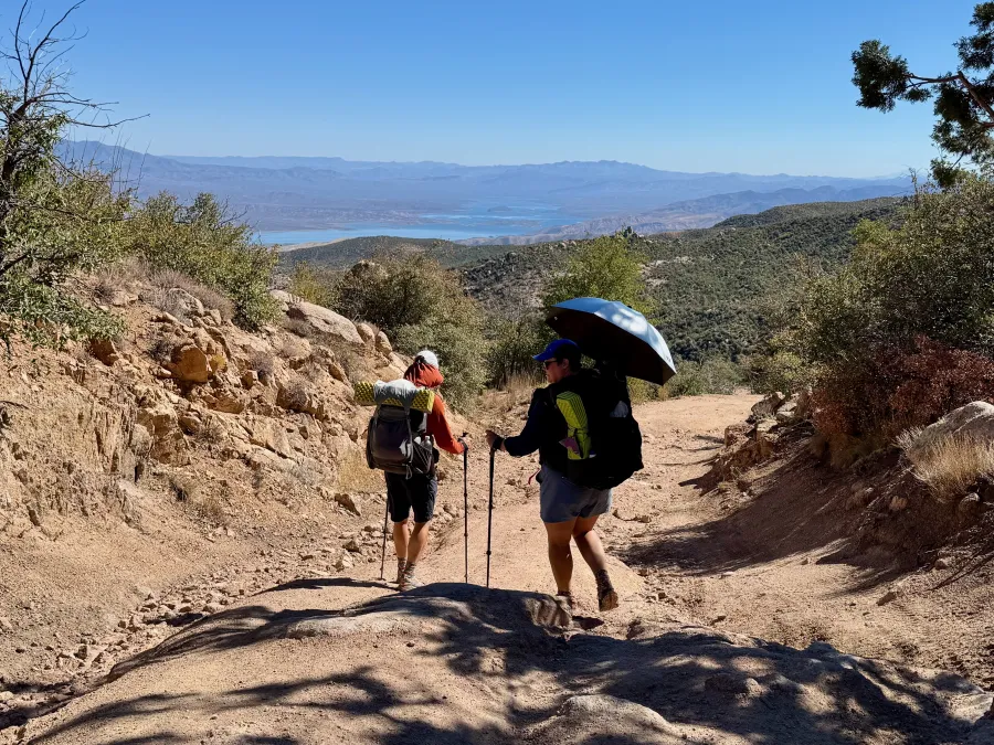The Captain and Snugbug hike down the trail