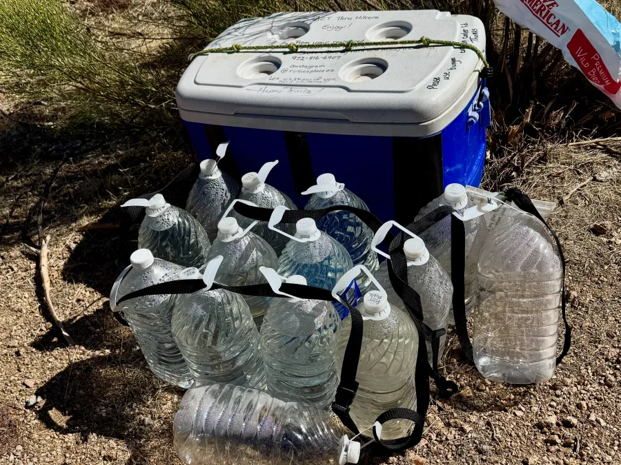 A cache of water left by trail angels