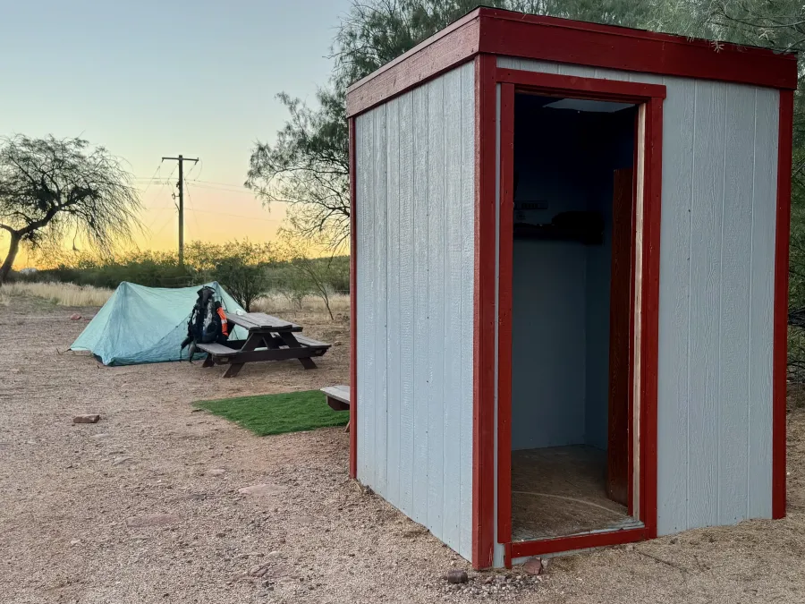 A shed next to an area set aside for hikers