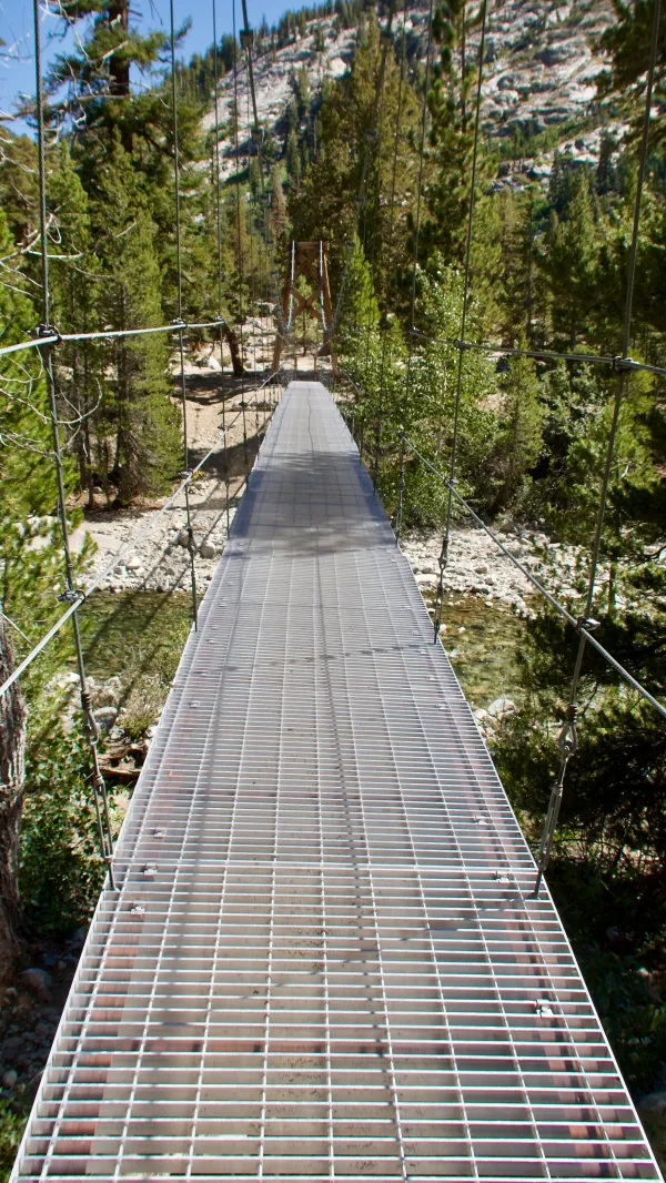 The suspension bridge over Woods Creek
