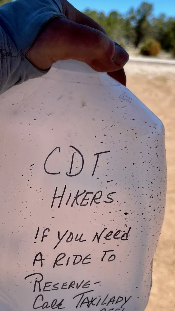 A note from Taxilady written on a water jug