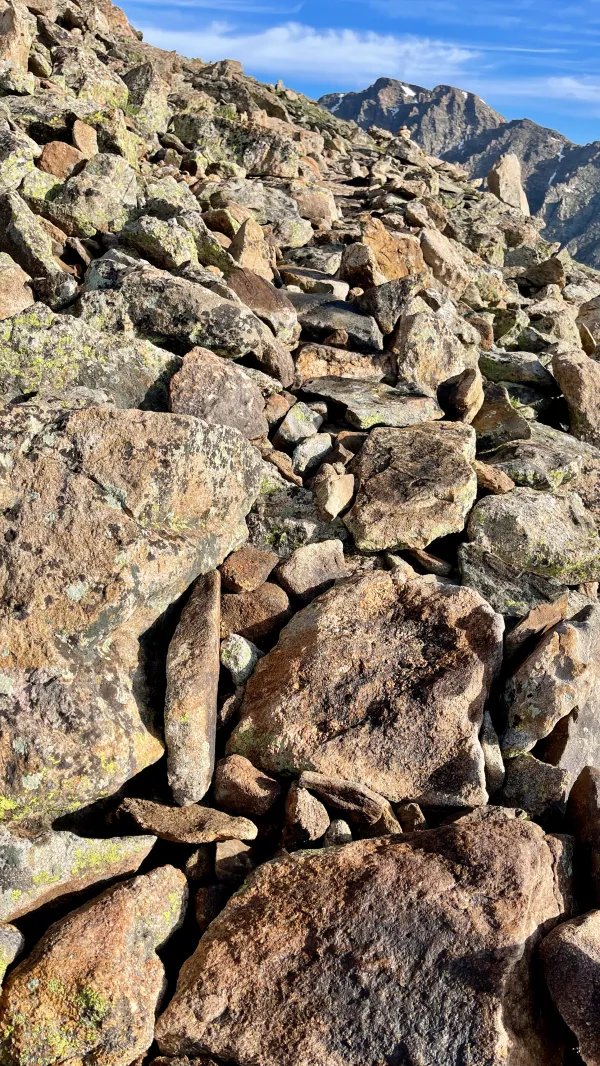 A trail cutting across a talus slope