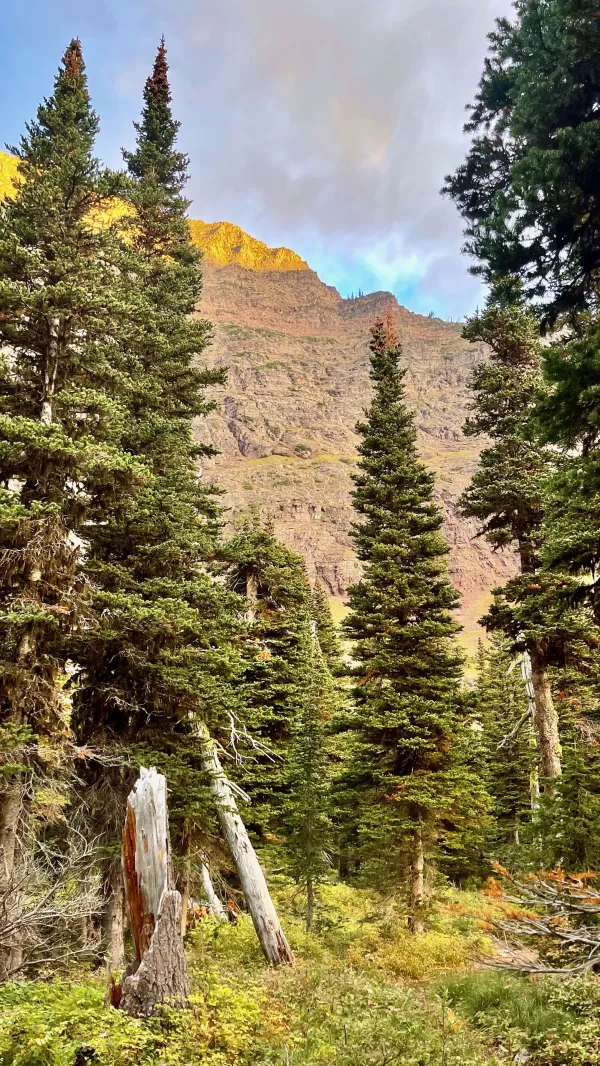 Morning sun hits the side of a mountain