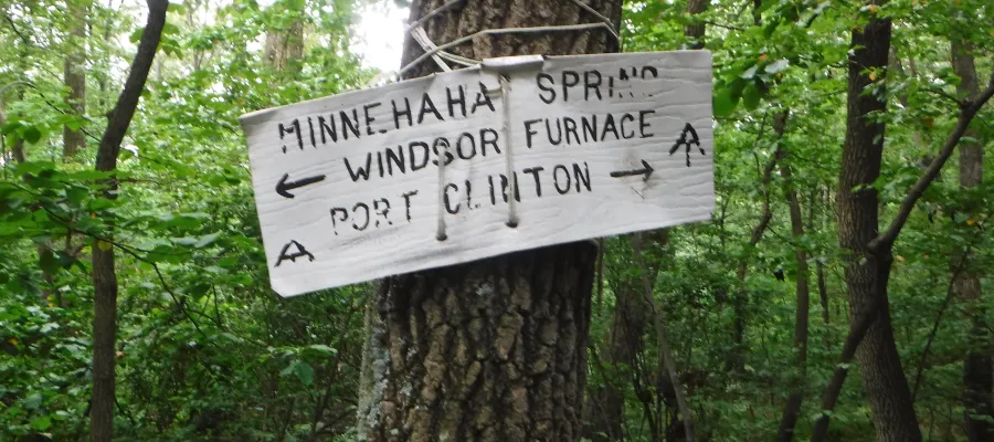 Crooked trail sign