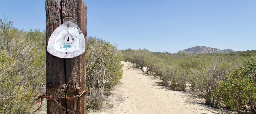 Faded trail sign