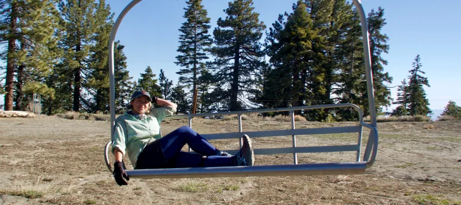 Spamalot sitting on a ski lift chair